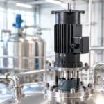Vertical three-phase gear motor mounted on a stainless steel mixing tank